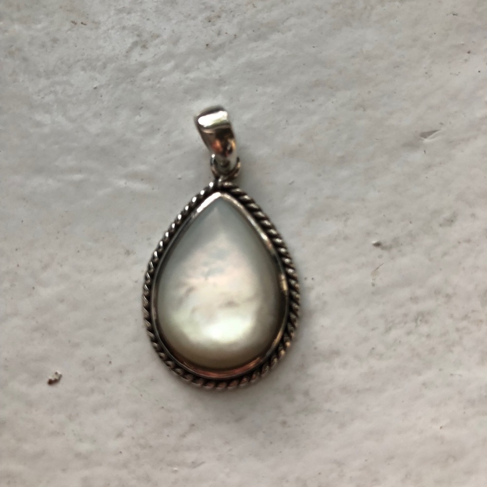 Opal and silver pendant